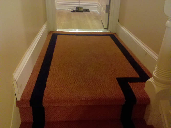 Custom Rug on stairs and hall